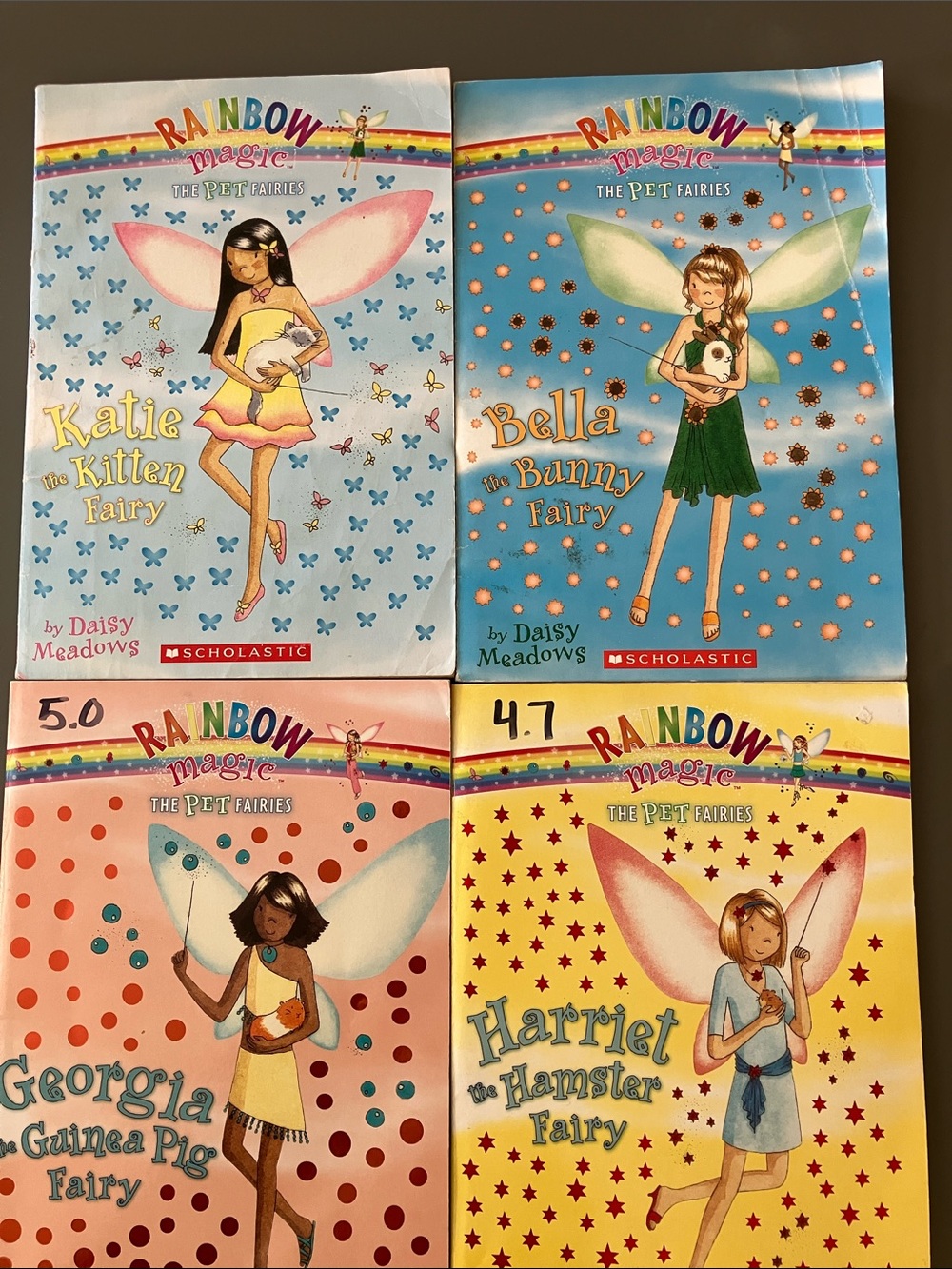 Rainbow Magic Pet Fairies Book Set - Blue, Pink, Yellow, Teal Covers
